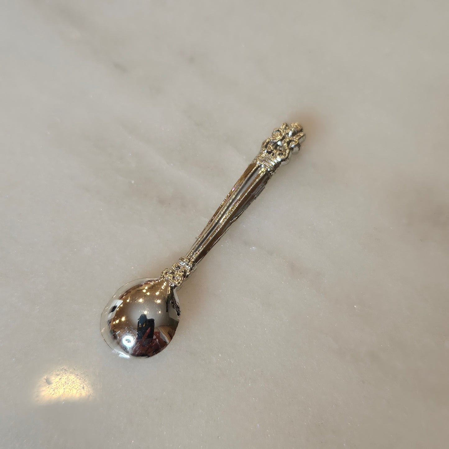 tiny silver spoon