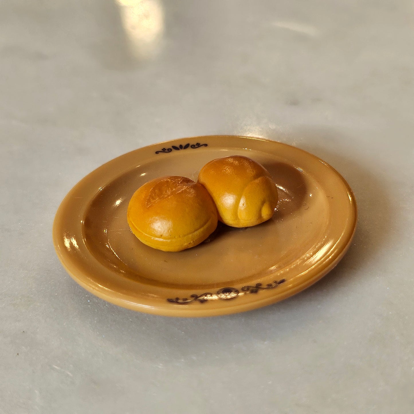 mini plate of bread rolls