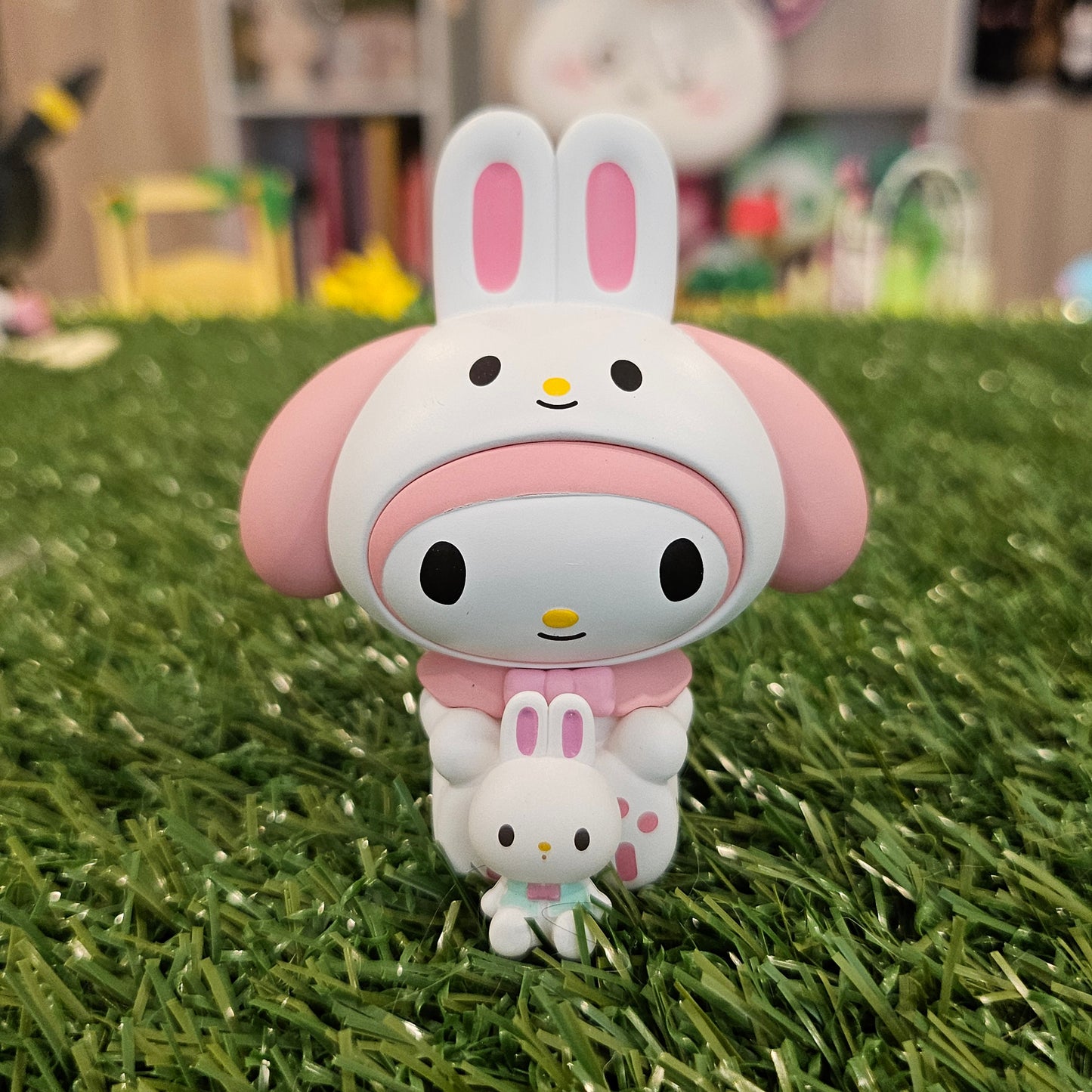 pink bunny with bunny figure