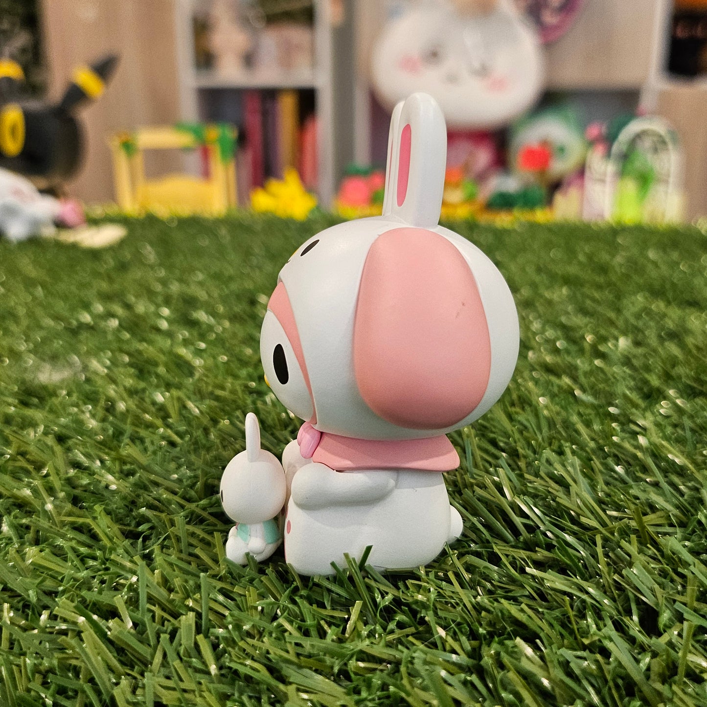 pink bunny with bunny figure