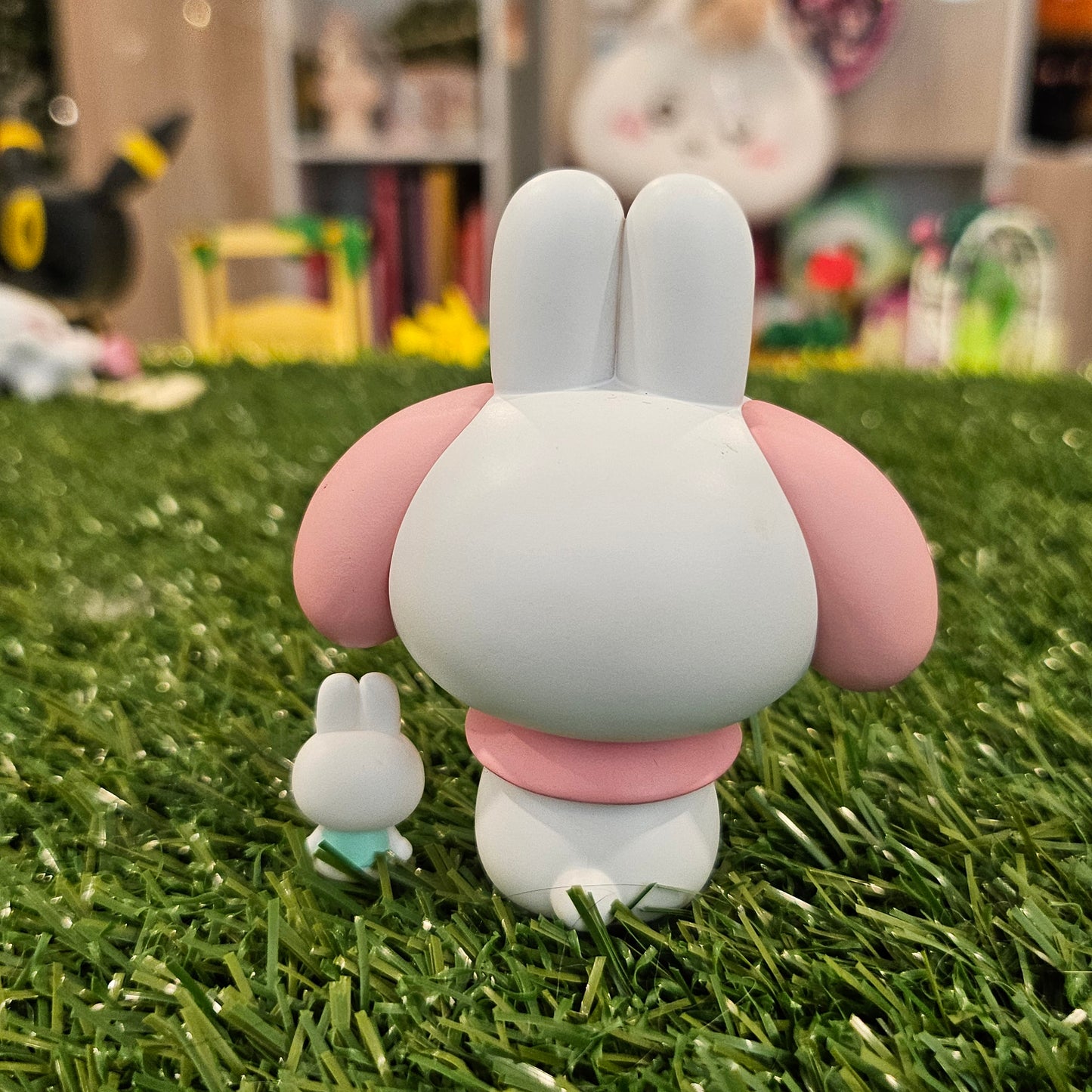 pink bunny with bunny figure