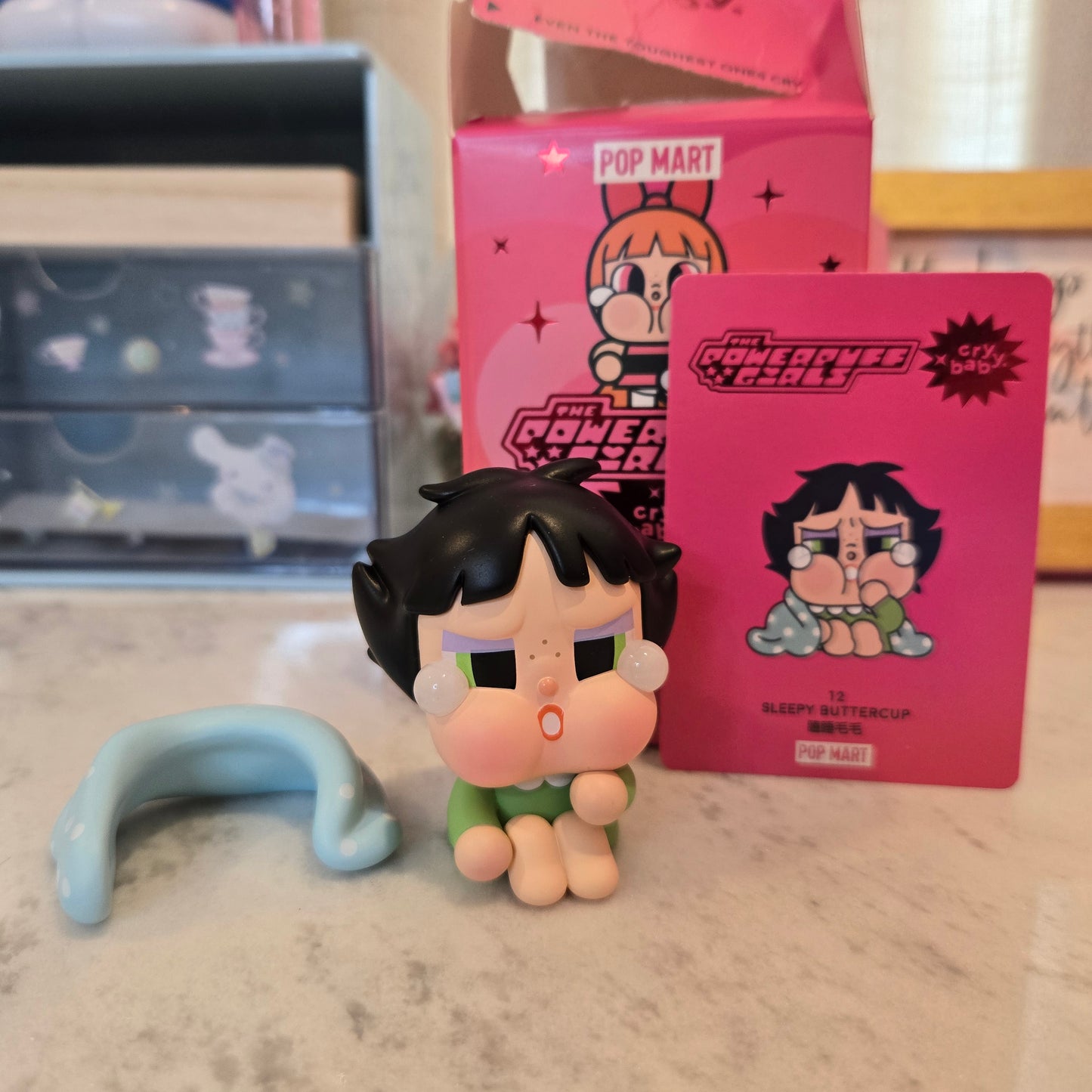 crying green with blanket
