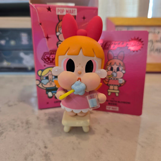 crying pink brushing teeth