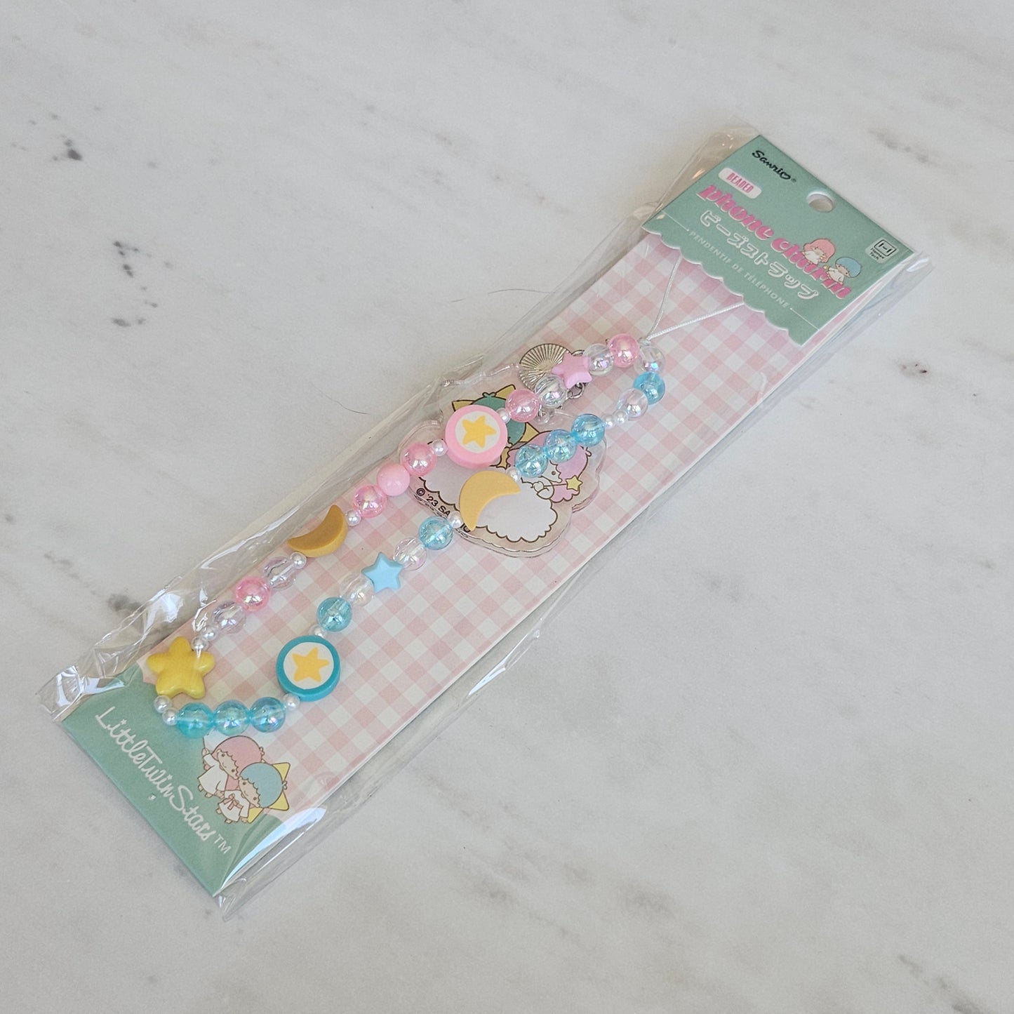 star twins phone charm