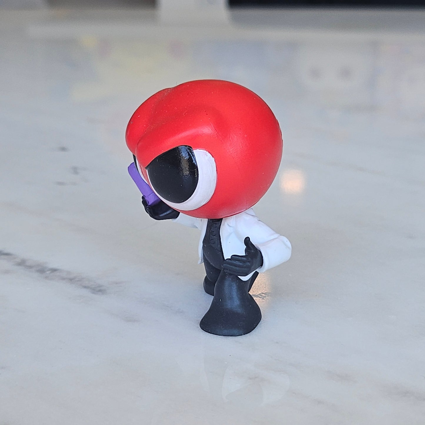 red scientist figure
