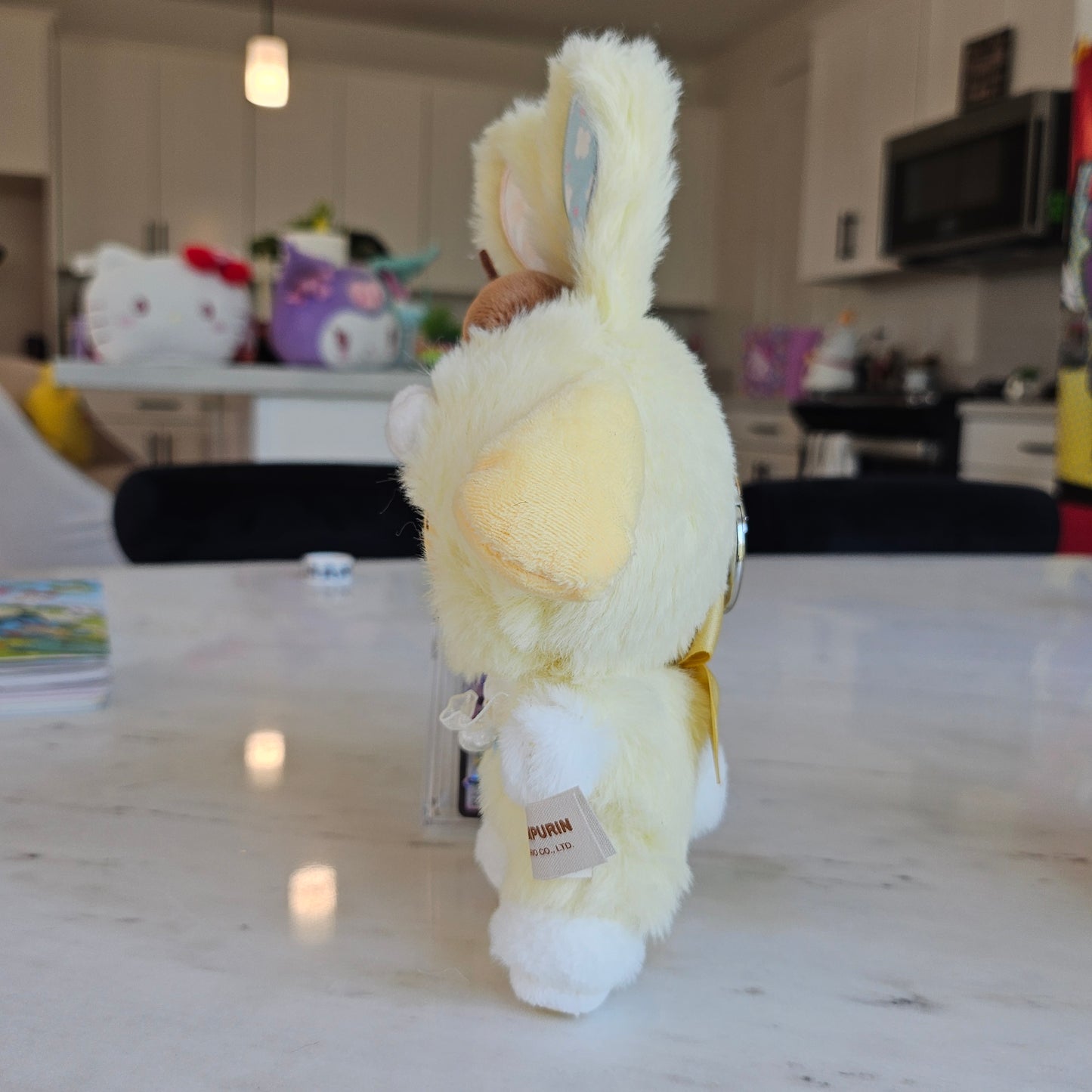 yellow dog as a bunny keychain