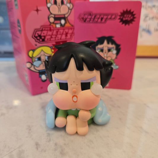 crying green with blanket
