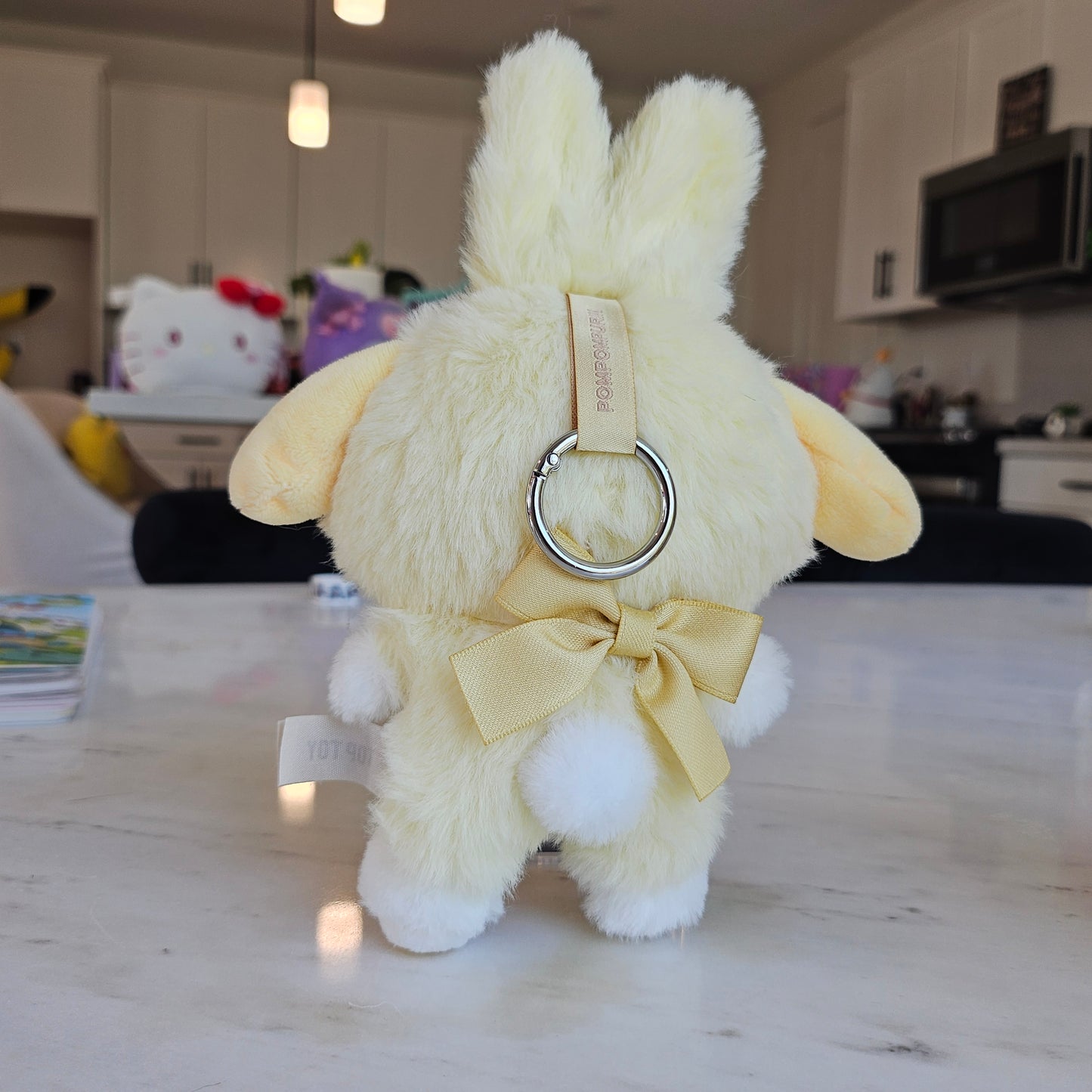 yellow dog as a bunny keychain