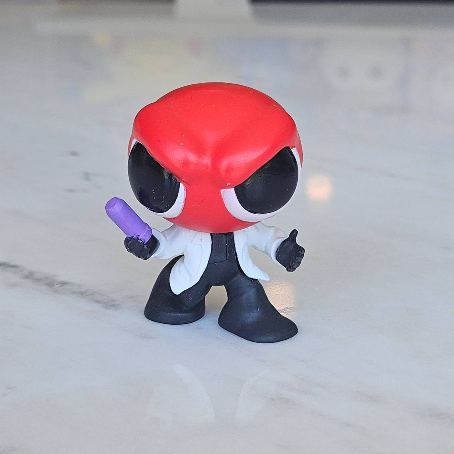 red scientist figure